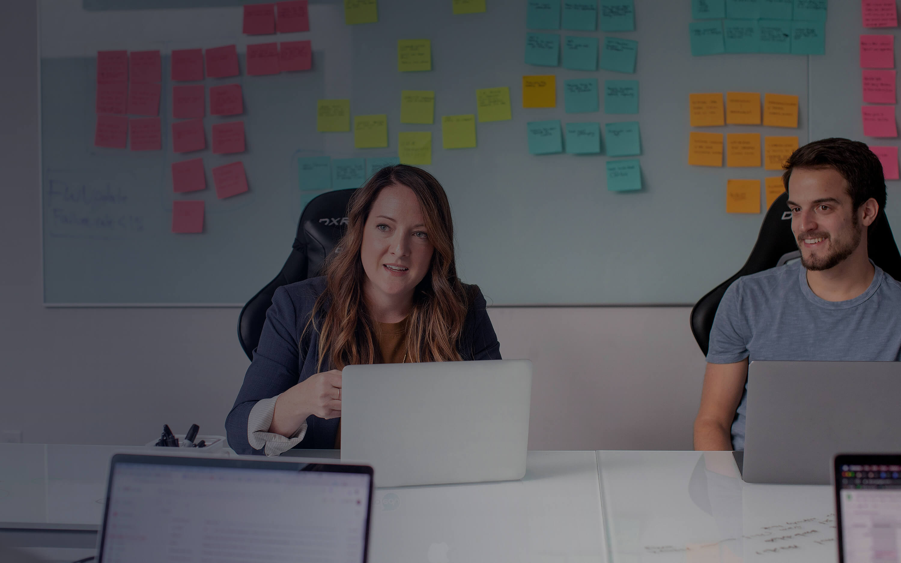 Planning Meeting with Coloured Post It Notes in a Planning Session