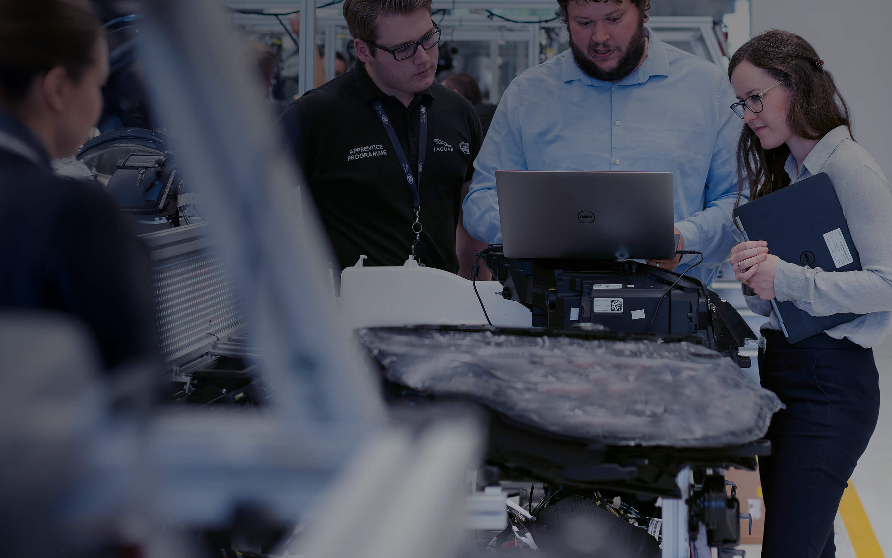 Standing Around a Laptop