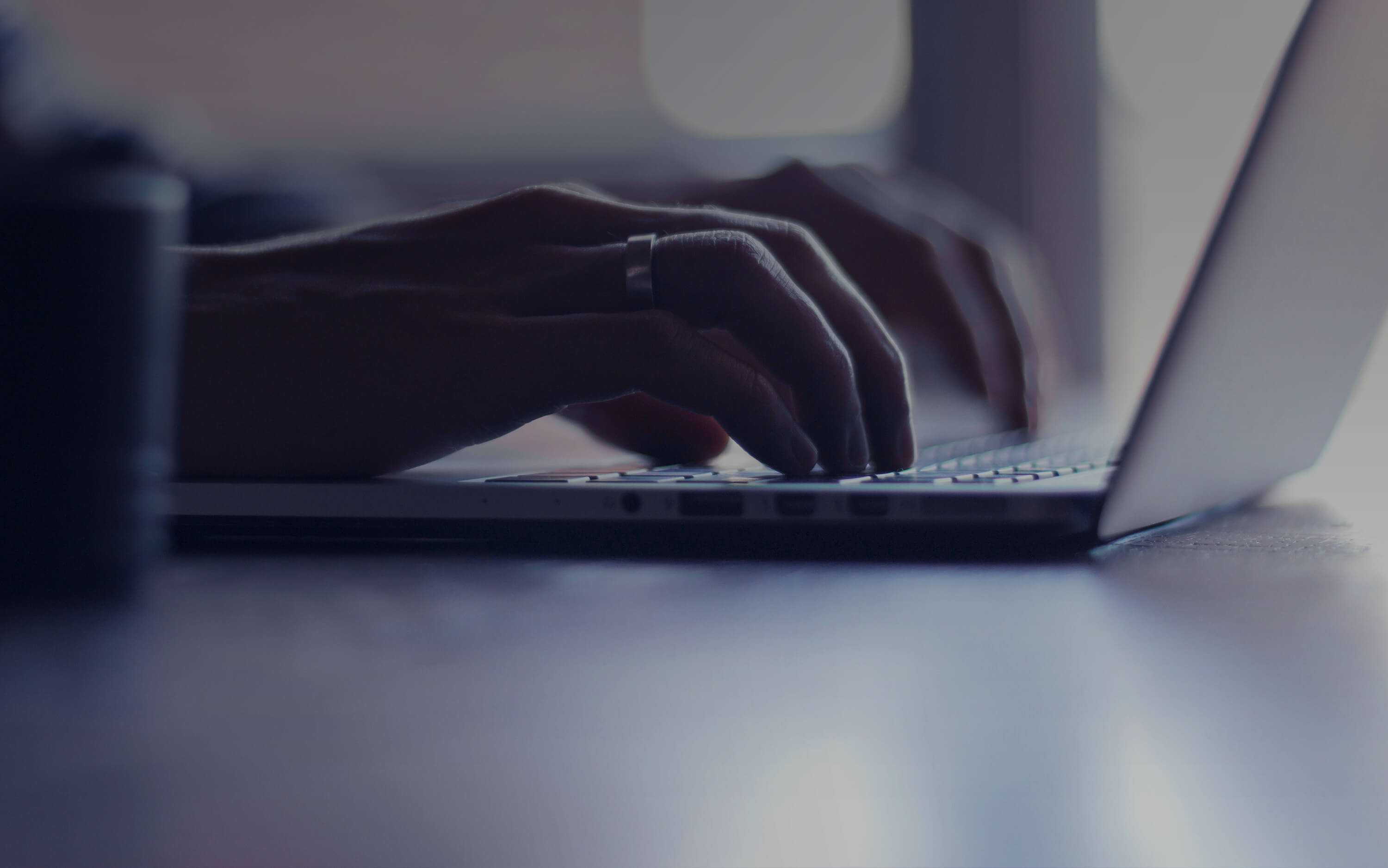 typing on a laptop