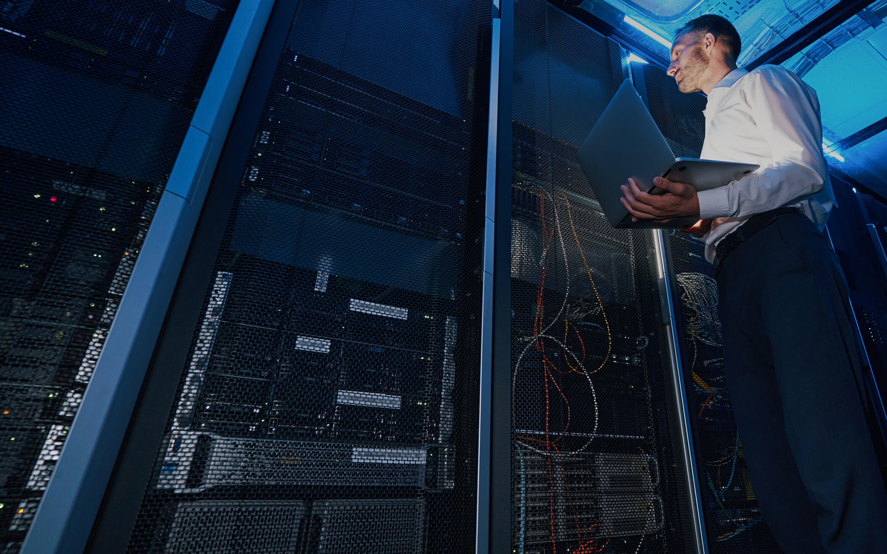 Man Checking a Server Rack