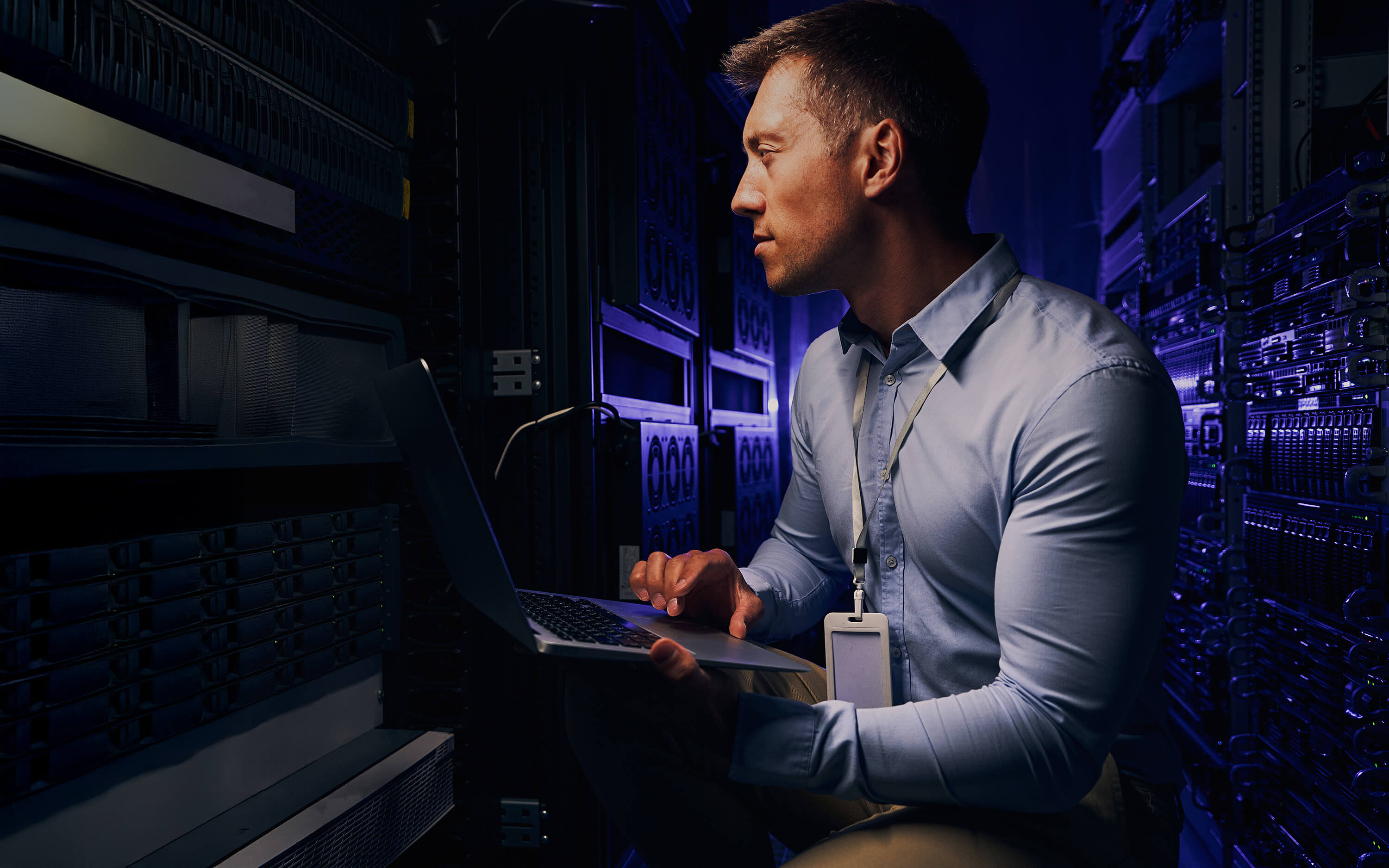 Man connected into server room