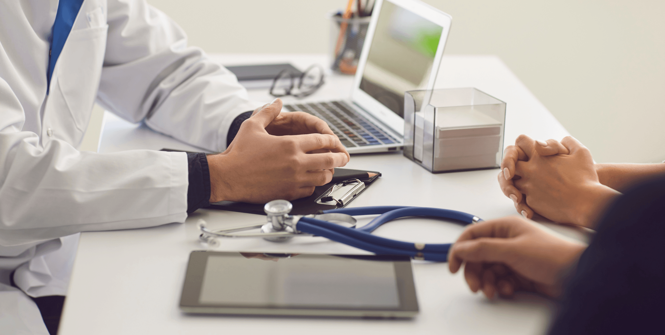 doctor consulting with patients