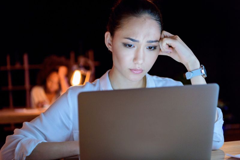 Woman frustrated with computer not working